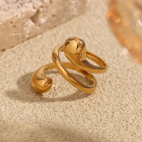 Anel Espiral Dourado com Zircônia